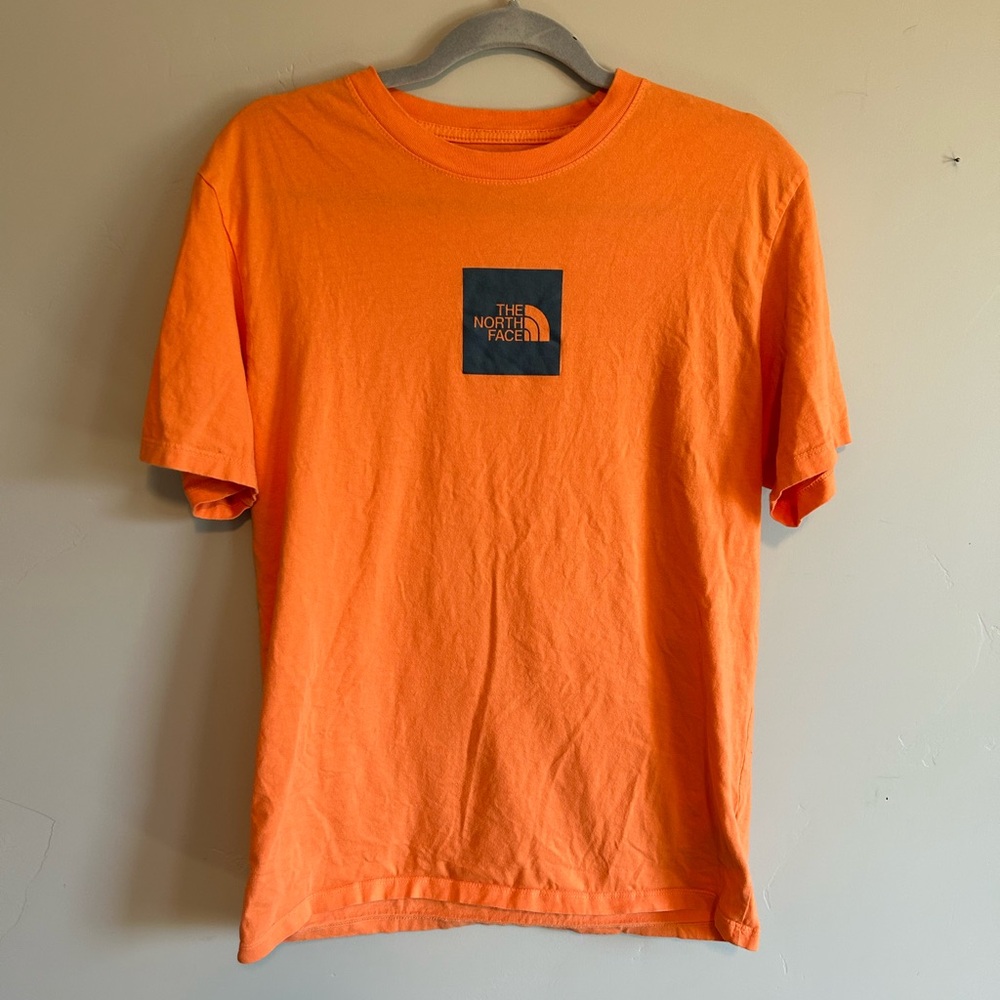 Orange men’s NorthFace T-shirt